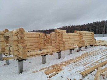 Строительство свайно-винтового фундамента для дома из бревна в Москве